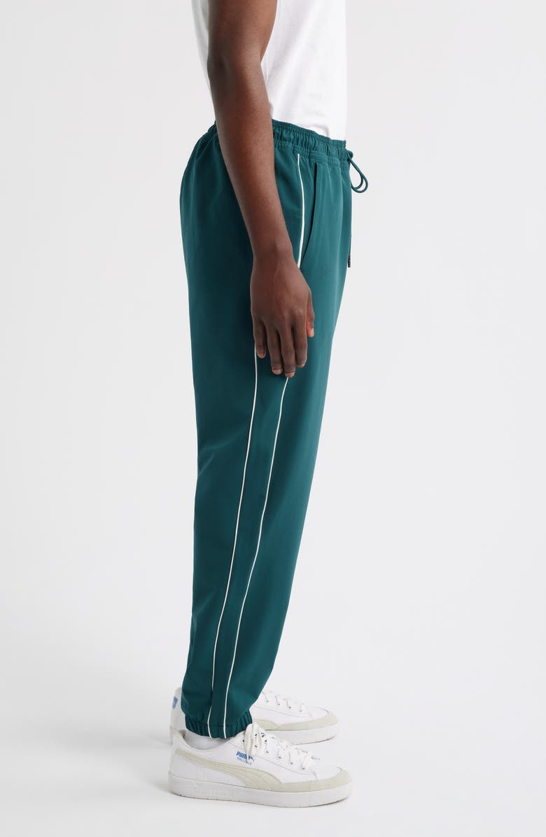 PUMA GOLF x Reigning Champ T7 Track Pants, Alternate, color, Green Terrain