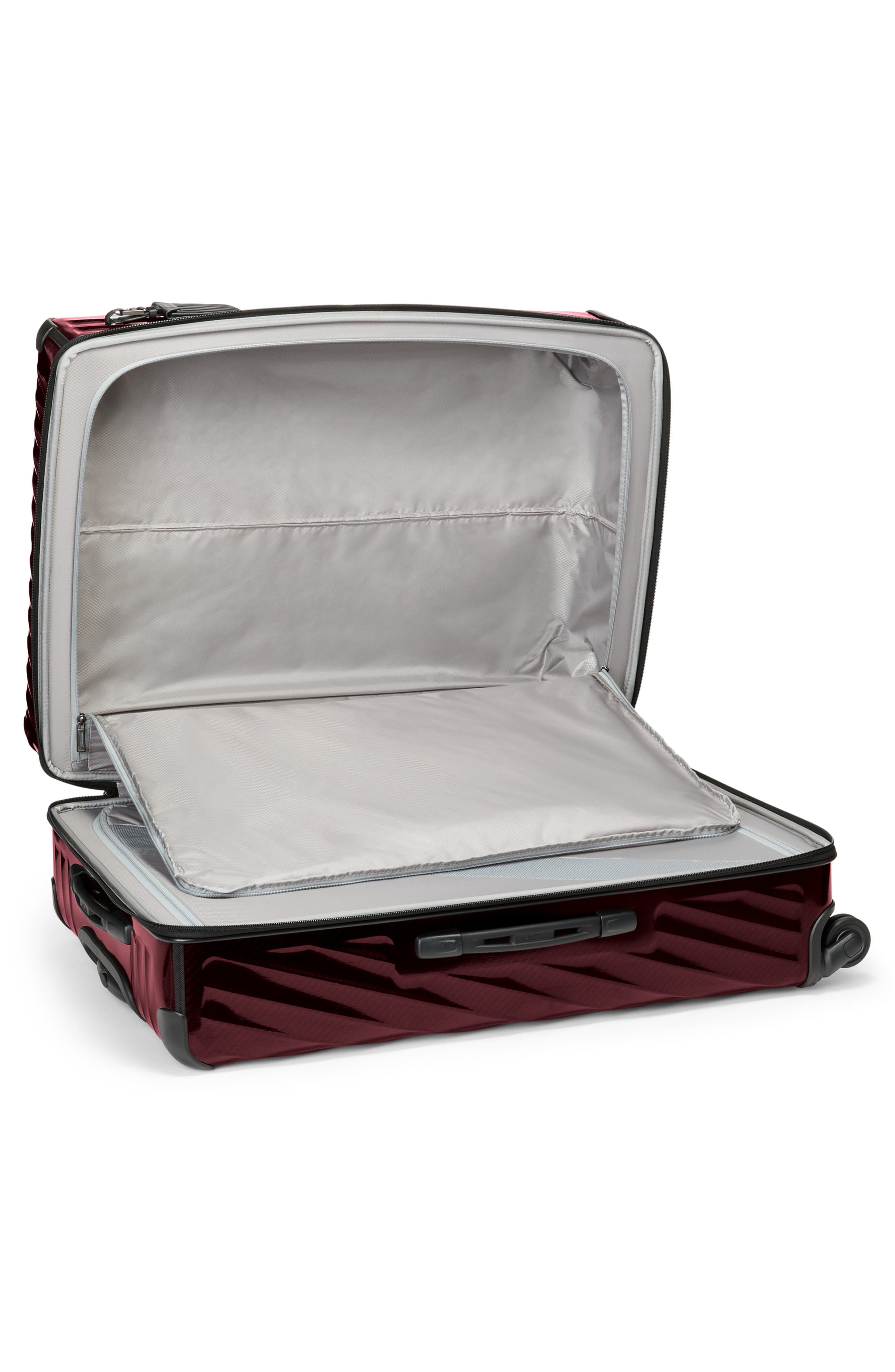 TUMI 30-Inch 19 Degree Extended Trip Expandable 4-Wheel Packing Case, Alternate, color, Wine
