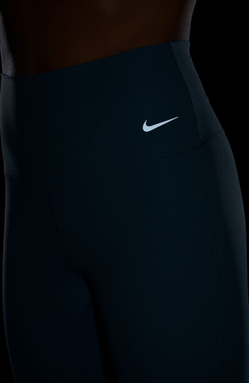 Shop Nike Zenvy High-waisted Flared Leggings