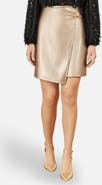 Yumi Faux Leather Wrap Mini Skirt