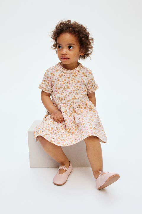 Ruffle-trimmed jacquard-jersey dress