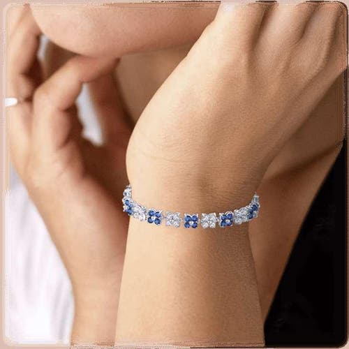 Hollywood Sensation Flower Cubic Zirconia Tennis Bracelet With Round Cut Sapphire Cubic Zirconia In Blue