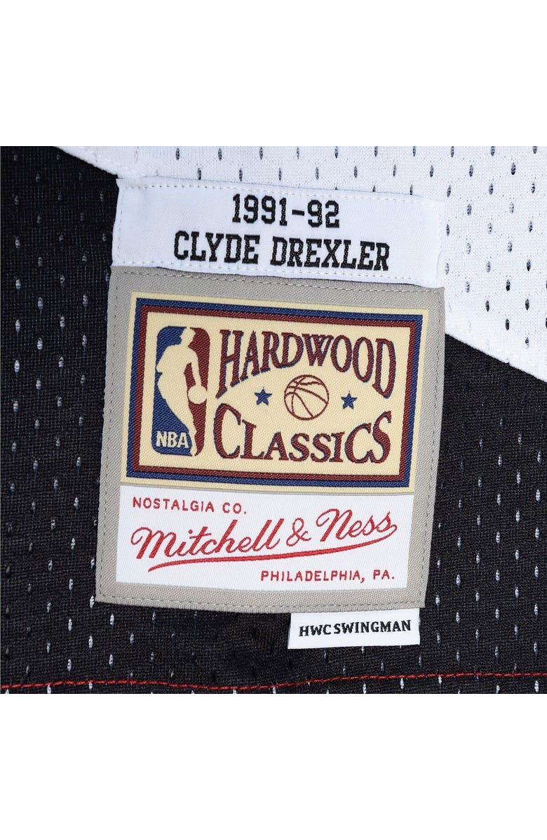 Mitchell & Ness Men's Mitchell & Ness Clyde Drexler Red/Black Portland Trail Blazers Hardwood Classics 1991/92 Split Swingman Jersey, Alternate, color, 