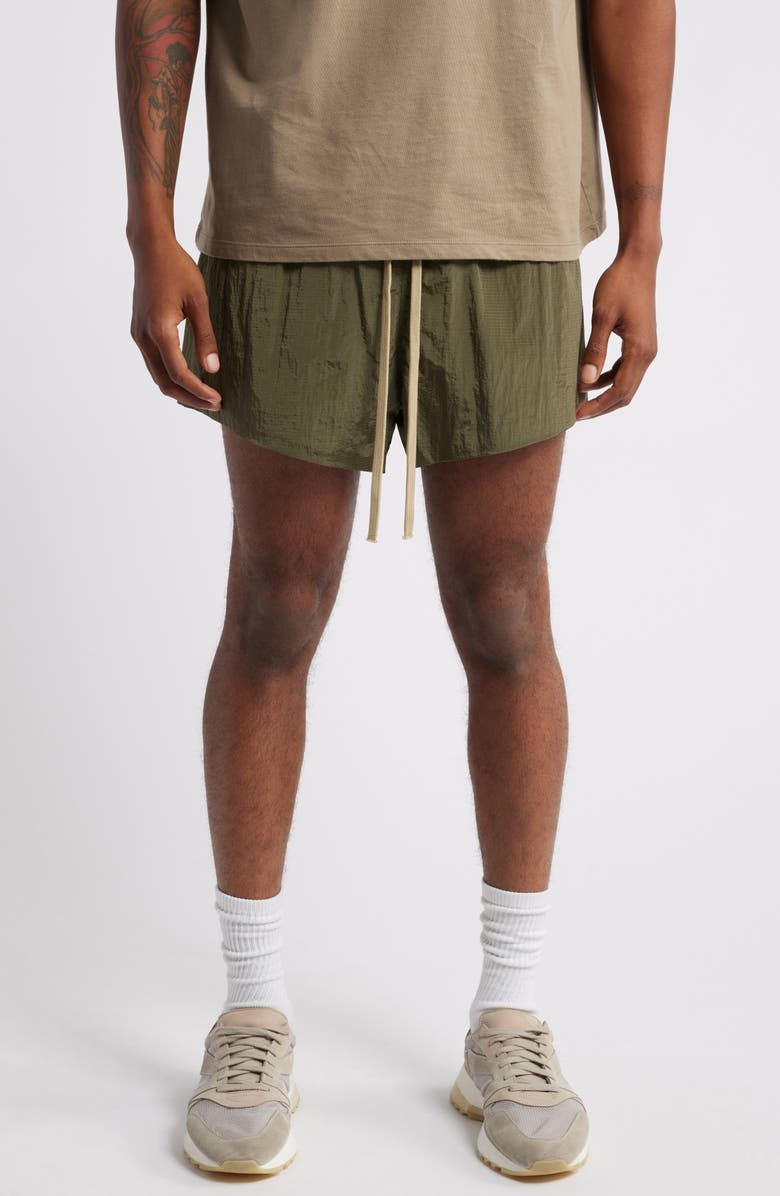 Fear of God Essentials Gender Inclusive Nylon Ripstop Running Shorts, Main, color, 