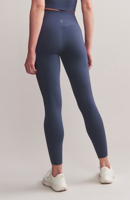 Rhone Revive Pockets 7/8 Leggings In Navy Blue