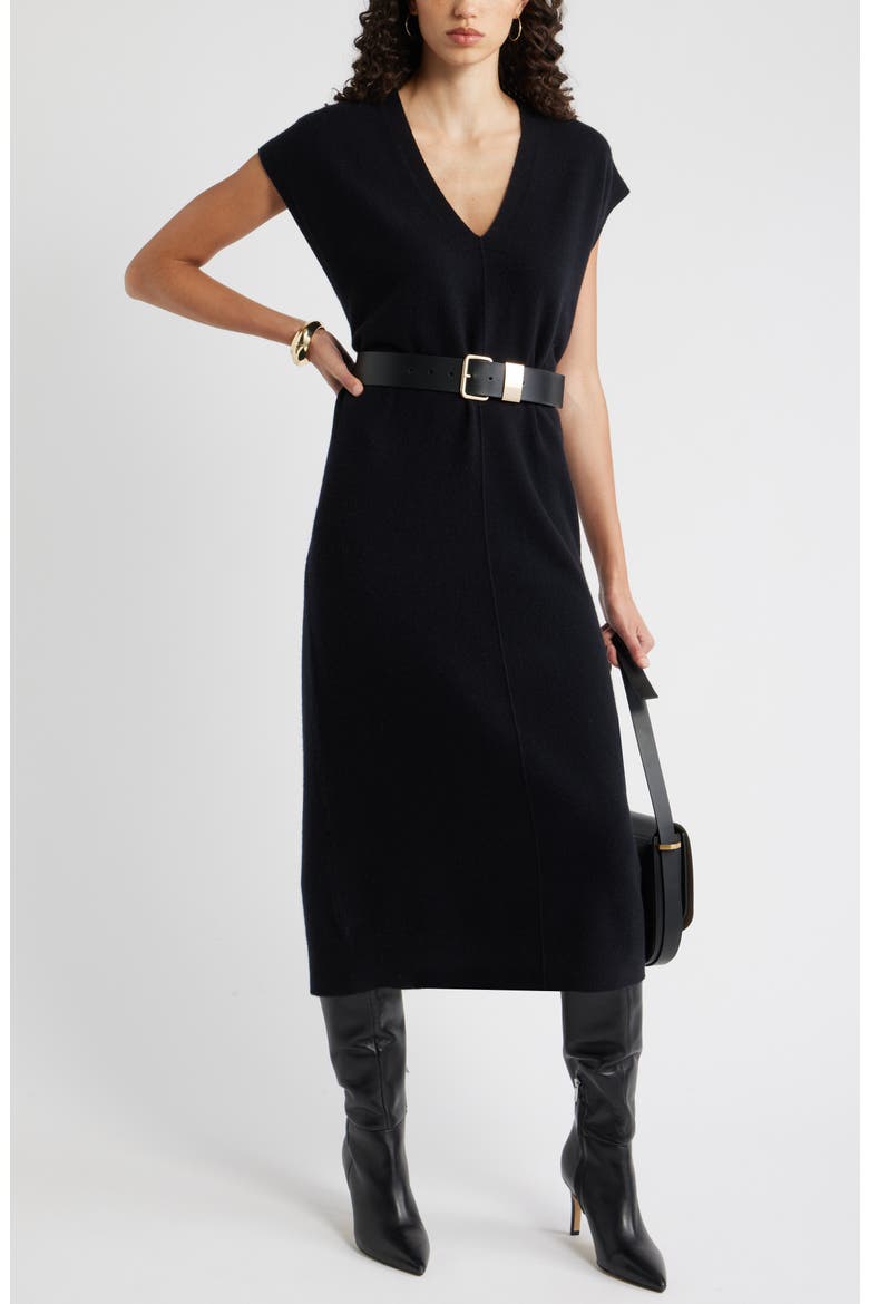 wool shift dress Margo Merino Structured shift silhouette with clean architectural lines Faux wool texture adds warmth and dimension Plunge neckline creates a sophisticated focal point Long sleeves with subtle flare detail Mini length perfect for showcasing legs This structured shift dress combines contemporary design with timeless appeal Thom Browne - Wool Mini
