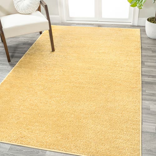 Shop Jonathan Y Haze Solid Low-pile Area Rug In Yellow/amber