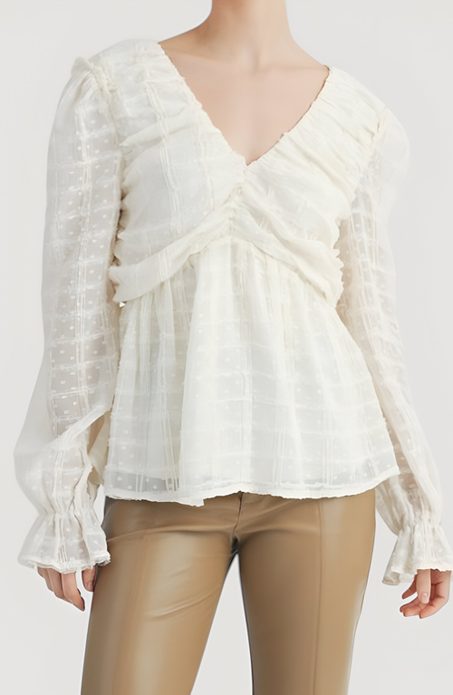 Modenaire Textured Long Sleeve Blouse With Peplum Hem And Back Bow Tie In White
