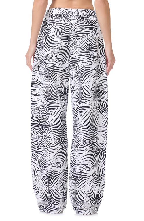 AFRM AFRM RHETT ZEBRA PRINT CARPENTER JEANS 