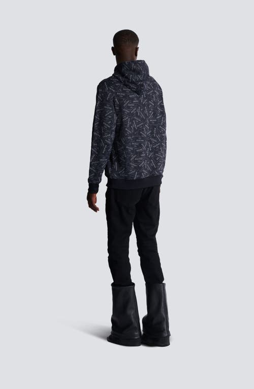 Shop Balmain Hoodie With All-over Label Print