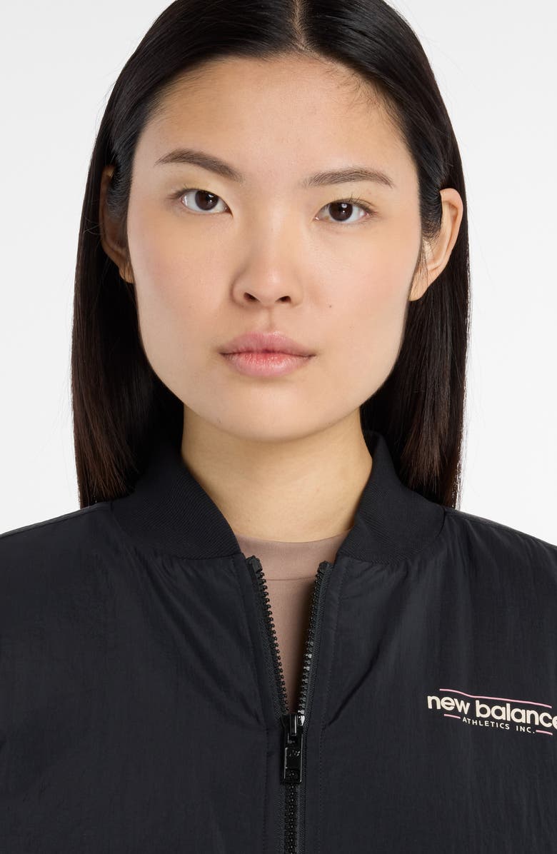 New Balance Reimagined Woven Bomber Jacket, Alternate, color, Black