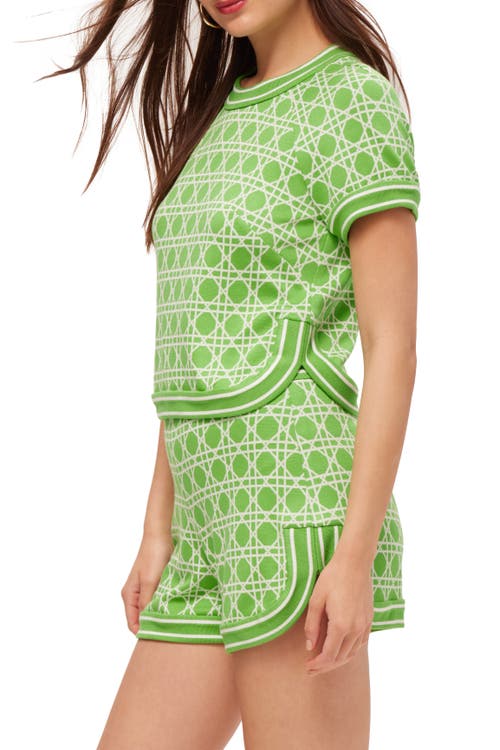 Shop Trina Turk Short Sleeve Geometric Knit Simona Top In Serene Green/white