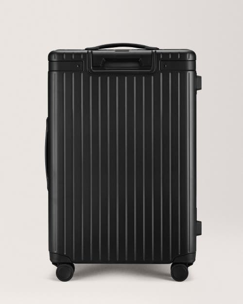 Carl Friedrik The Check-in Suitcase In Black/black