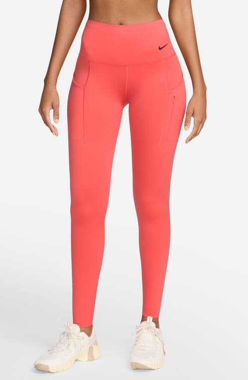 Shop Nike Universa Medium-support High-waisted Pocket 7/8 Leggings In Magic Ember/black