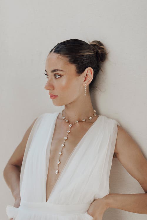 Untamed Petals Taurus Crystal Drop Earrings In Gold