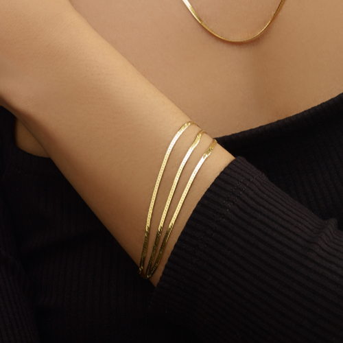 The Lovery Fine Jewelry Triple Strand Herringbone Bracelet In Gold