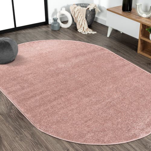 Jonathan Y Haze Solid Low-pile Oval Area Rug In Pink/magenta