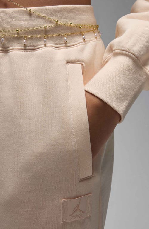 Shop Jordan Flight Fleece Sweatpants In Guava Ice