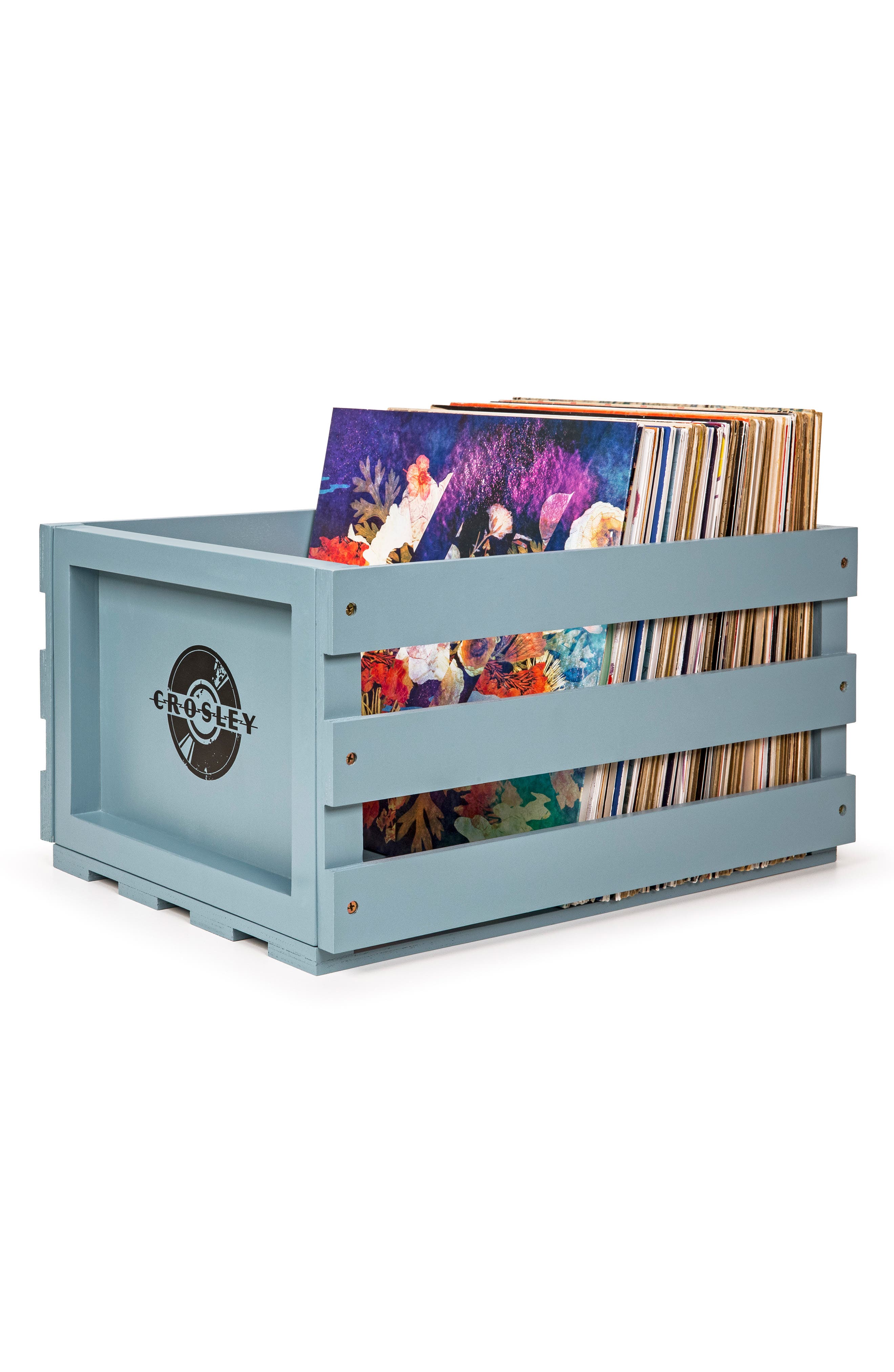 A light blue wooden crate filled with vinyl records, Crosley logo on the side.