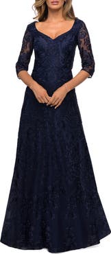La Femme Embroidered Lace Gown with V Neckline and Flare Skirt