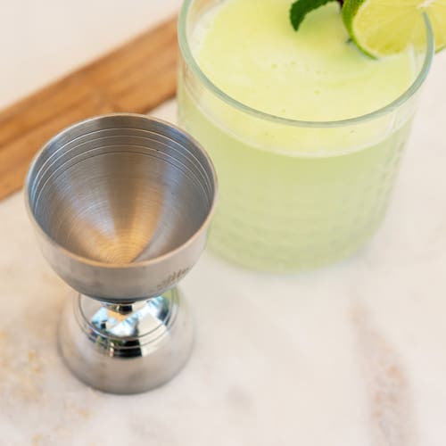 A Bar Above Bell Cocktail Jigger In Stainless Steel