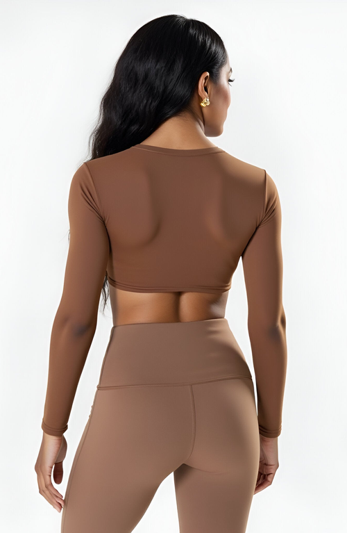 Modenaire Active Long Sleeve Twist Front Crop Top In Brown