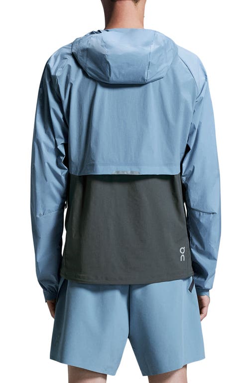 On Core Hooded Packable Running Jacket In Chambray/eclipse