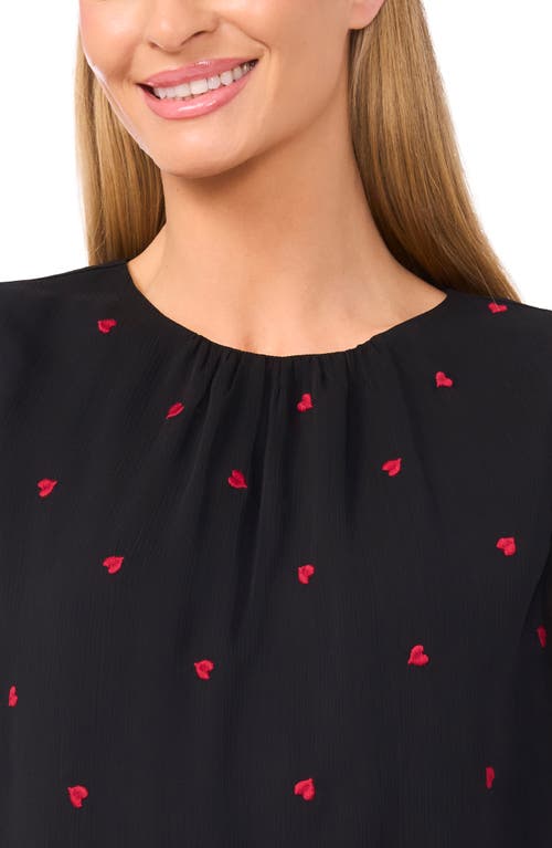 Cece Embroidered Heart Bell Sleeve High-low Top In Black