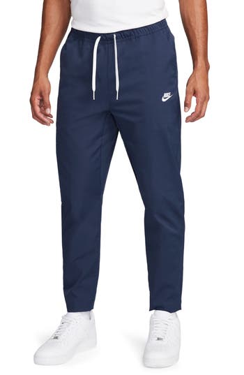 Nike Woven Tapered Leg Pants In Blue