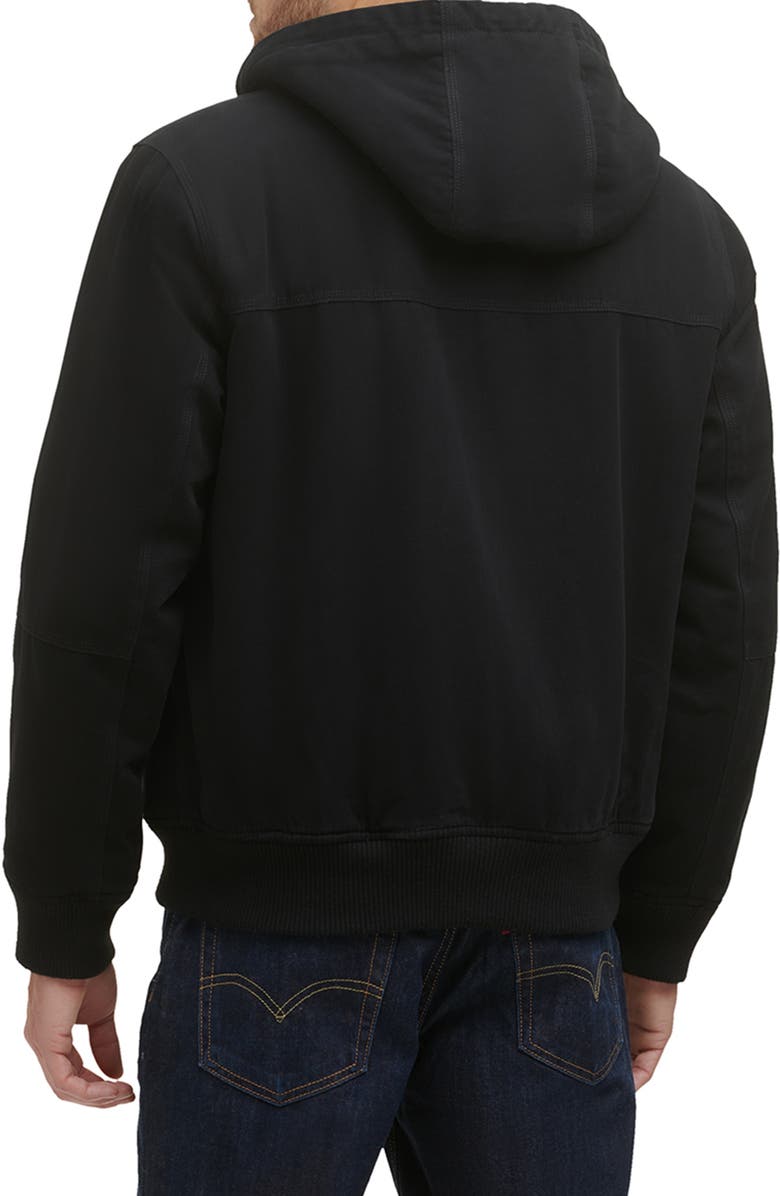 Levi's<sup>®</sup> Workwear Cotton Canvas Faux Shearling Lined Hoodie Bomber Jacket, Alternate, color, Black
