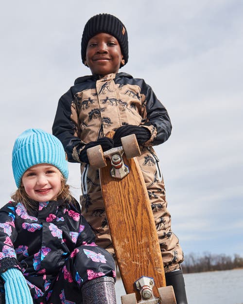 DEUX PAR DEUX DEUX PAR DEUX LITTLE BOY'S PRINTED MID-SEASON ONE-PIECE OUTERWEAR BLACK DINOSAUR ON BEIGE BACKGROUND