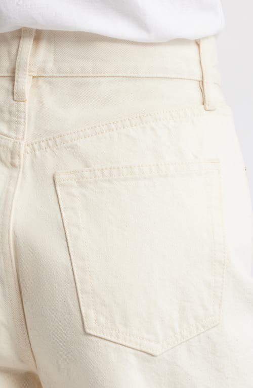 Shop Frame The Timeless Cutoff Denim Shorts In Milkshake