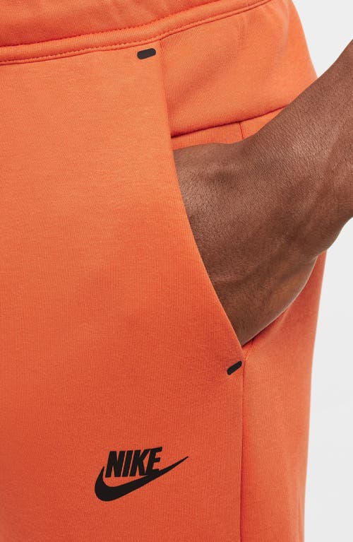 Nike Tech Fleece Joggers In Orange