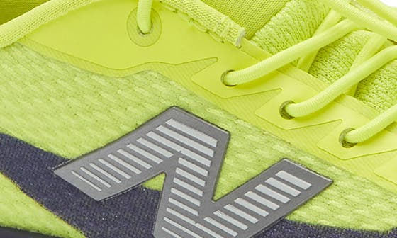 Детские New Balance Kids' FuelCell Rebel Sneaker — фото 7