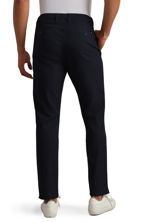 Rhone Nomad Slim Fit Tech Water Repellent Chinos In Blue