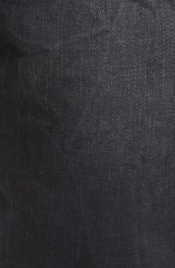 Ripped Knee Blowout Slim Jeans
