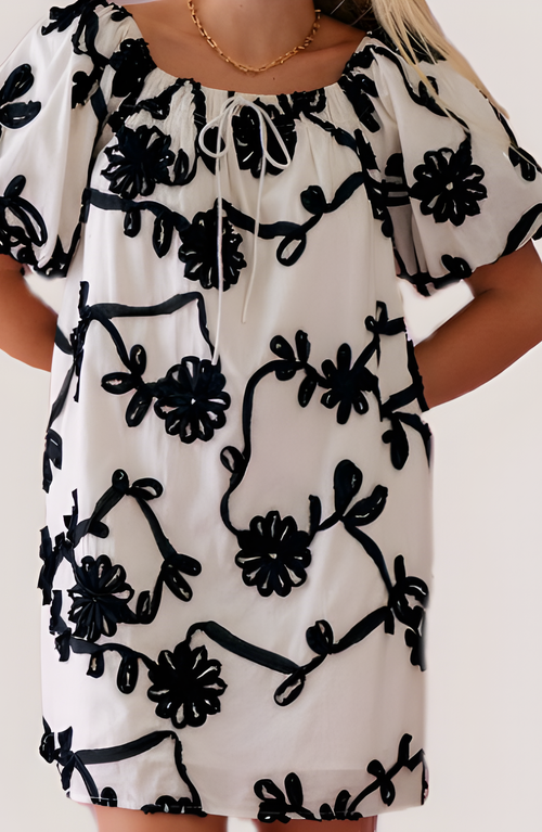 Modenaire Textured Floral Mini Dress With Puff Sleeves And Tie Neckline In Multi