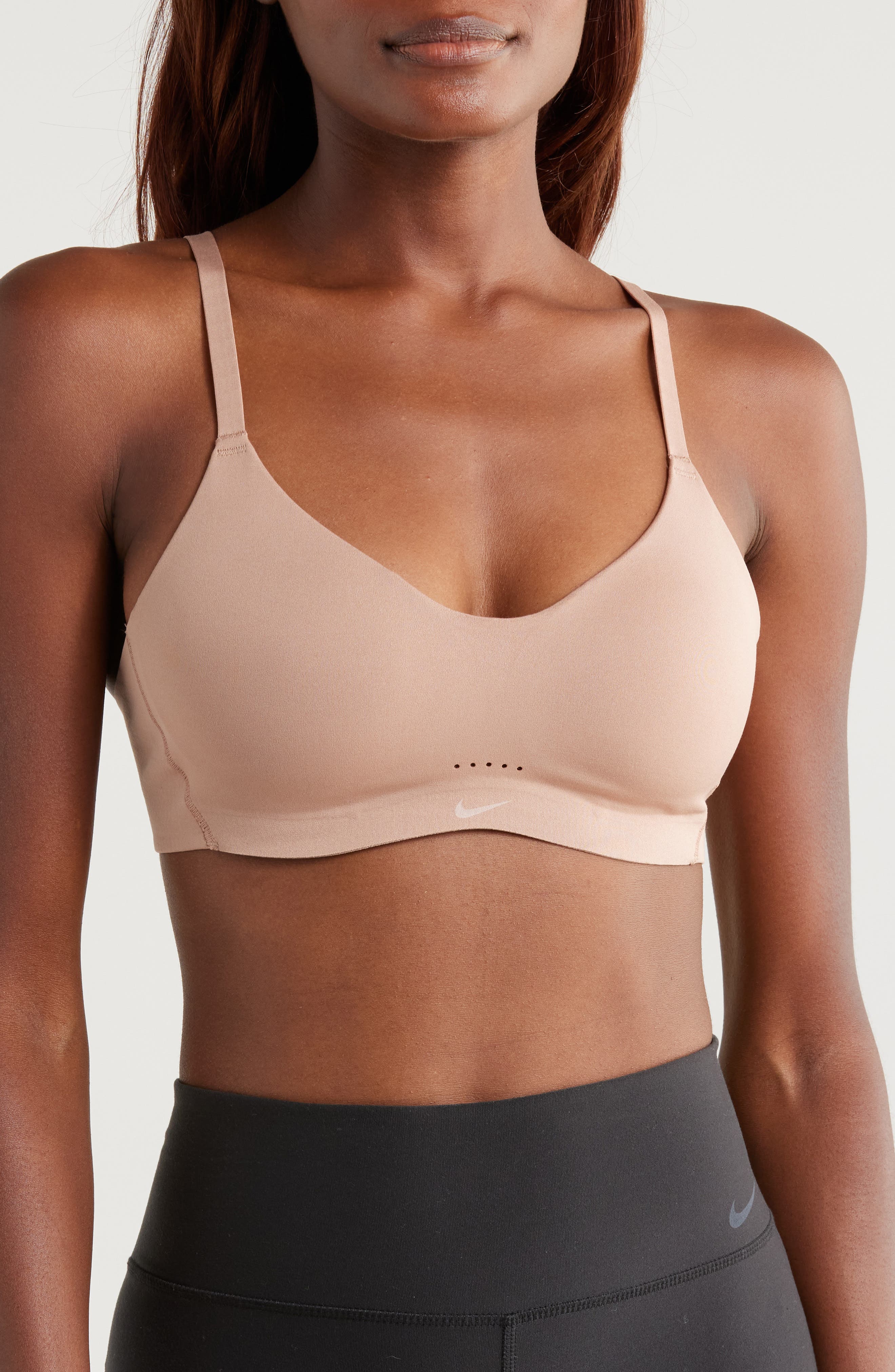 beige nike sports bra