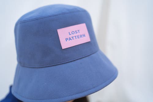 Lost Pattern Nyc "forest" Cotton Reversible Bucket Hat In Blue