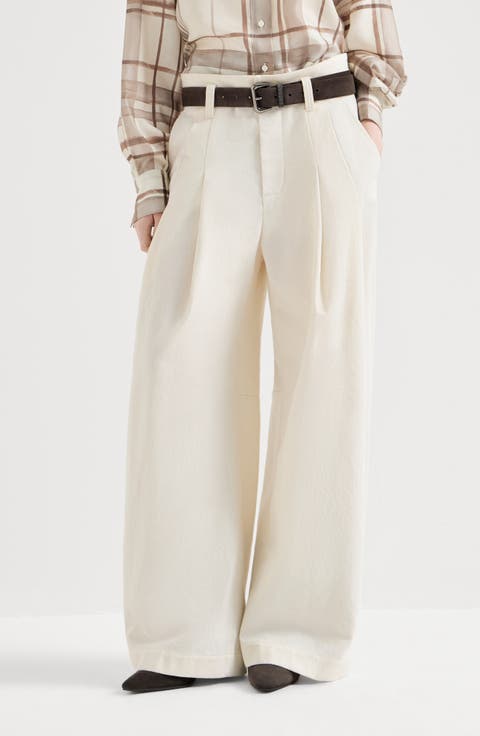Dyed cotton and wool wrinkled denim five-pocket baggy trousers with monili