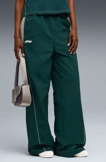 Puma Formula 1® Woven Nylon Wide Leg Pants In Green