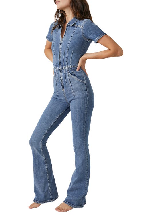 Free People Jayde Denim Flared Jumpsuit In Sunburst Blue
