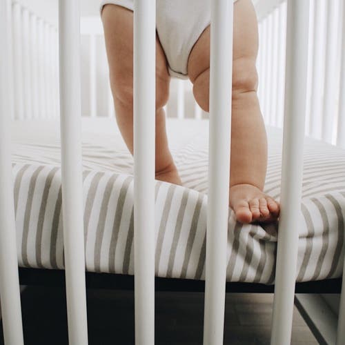 Ely's & Co. Patent Pending Waterproof Crib Sheet In Taupe Stripes & Splash