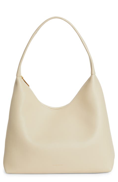 Ivory designer bag sale