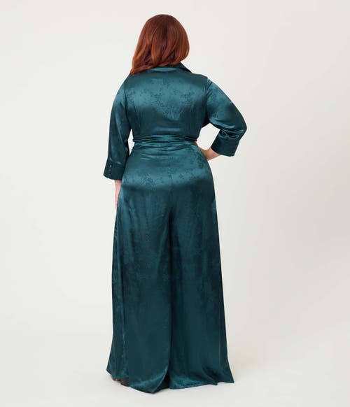 Unique Vintage Plus Size 1970s Satin Flare Jumpsuit In Blue
