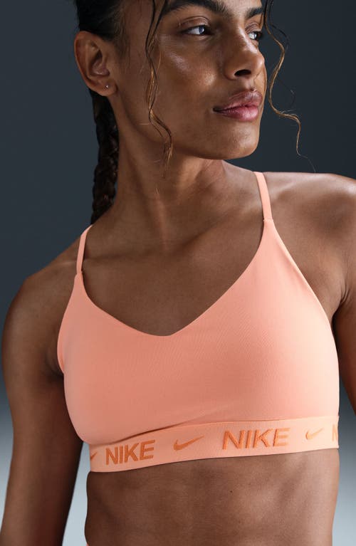 Nike Indy Light Support Padded Adjustable Sports Bra In Orange