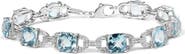Haus of Brilliance Silver 7x7 mm Cushion Cut Blue Topaz and Diamond Accent Tennis Bracelet