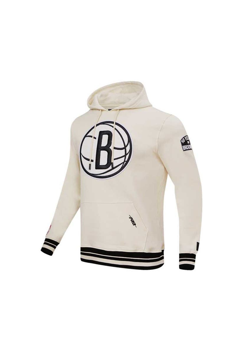 PRO STANDARD Men's Pro Standard Cream Brooklyn Nets Retro Classic Fleece Pullover Hoodie, Alternate, color,