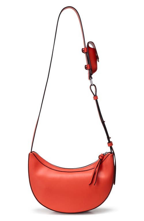 Oryany Rookie Crescent Leather Crossbody Bag In Orange