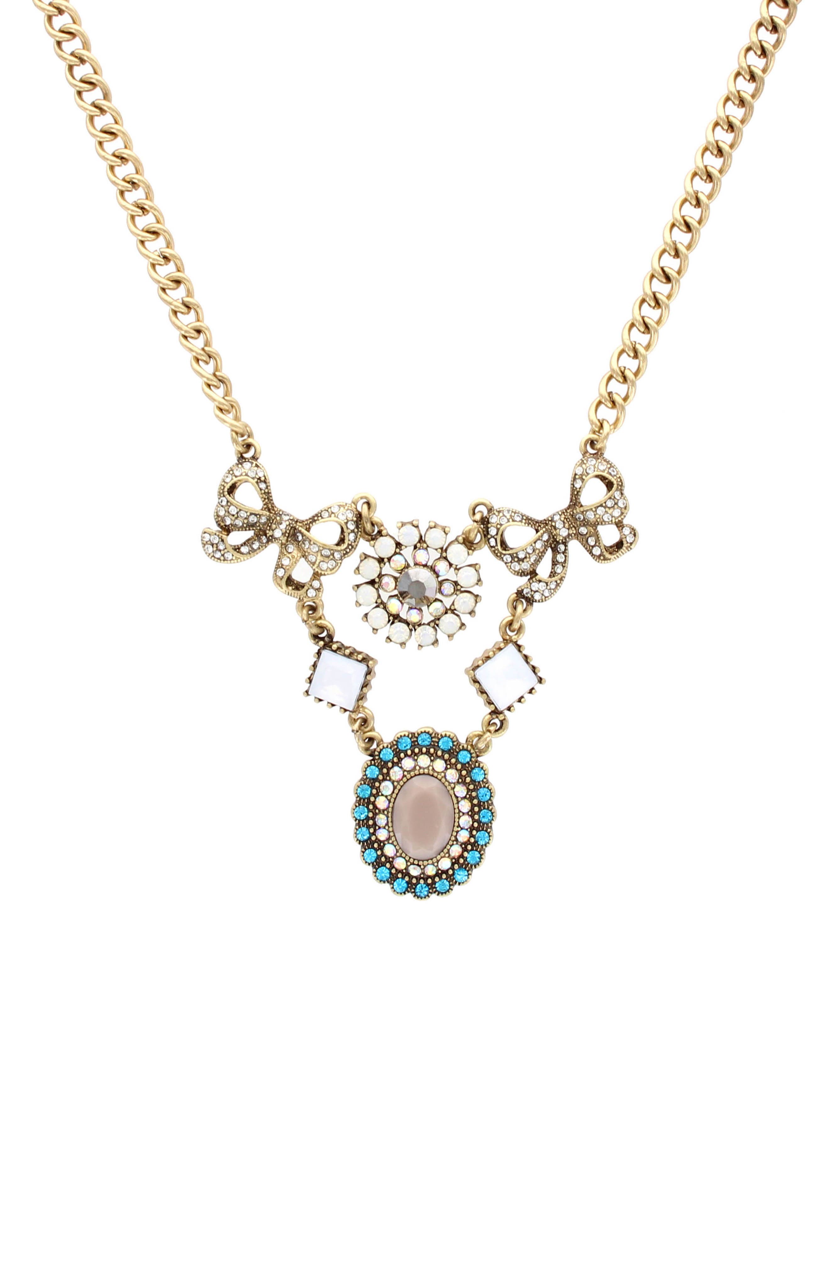 OLIVIA WELLES Rosella Mixed Charm Frontal Necklace